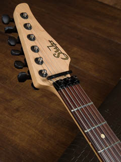Suhr Standard Quilt Trans Forest Green ヘッド正面 サムネイル